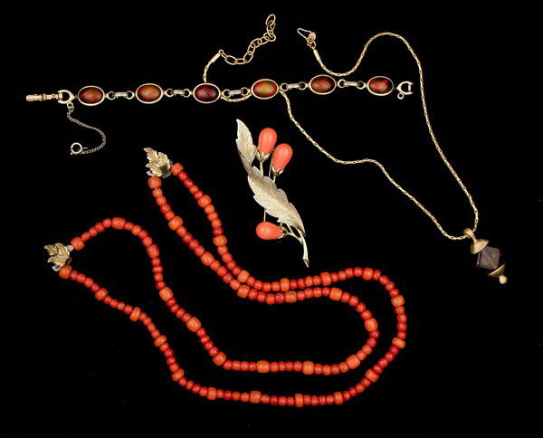 Sarah Coventry, Marvella & Monet Costume Jewelry C: A Sarah Coventry bracelet, a Sarah Coventry brooch, a Marvella double strand necklace and a Monet pendant; all signed pieces are stamped.
