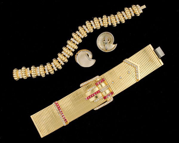 JBK, Trifari & Unsigned Costume Jewelry Collection: A JBK gold toned bracelet, a pair of Trifari ear clips and an unsigned buckle bracelet; all signed pieces are stamped.