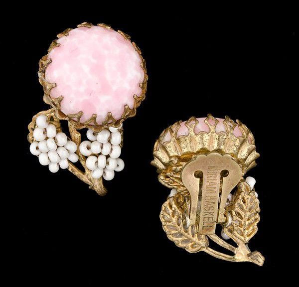 Pair of Miriam Haskell Earclips : A pair of Miriam Haskell floral earclips with mottled pink stones and beaded leaves; all signed pieces are stamped.