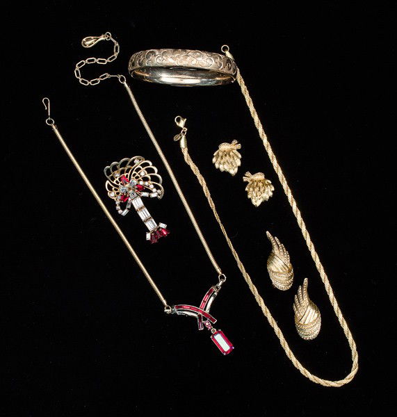 Monet, L.M.&Co, Phyllis, & Coro Costume Jewelry Co: A L.M. & Co hinged bangle bracelet, a pair of Monet ear clips, a pair of Monet ear clips, a classic Monet rope chain in a gold tone and a Coro necklace; all signed pieces are stamped.