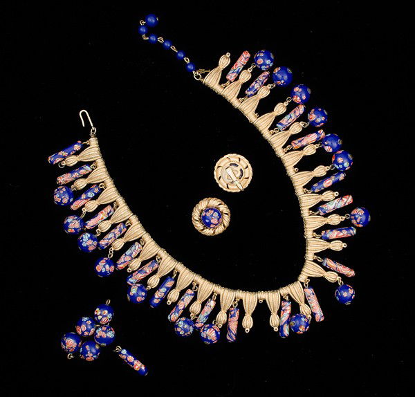 Trifari Costume Jewelry Collection : A Trifari necklace and ear clip set with matching beads; all signed pieces are stamped.