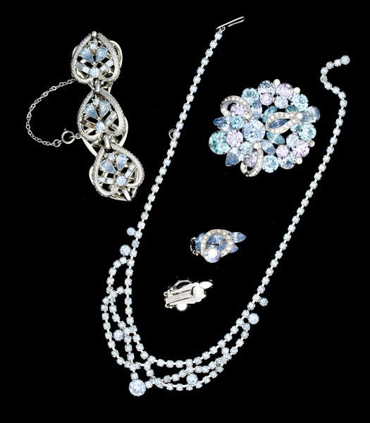Coro, Eisenberg, Weiss & Unsigned Costume Jewelry: A Coro bracelet, an Eisenberg brooch, a pair of Weiss ear clips and an unsigned necklace; all signed pieces are stamped.