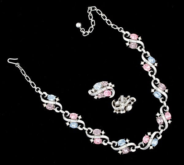 Trifari Costume Jewelry Collection : A matching set of Trifari ear clips and necklace; all signed pieces are stamped.