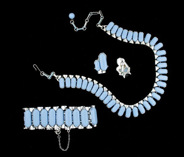 Coro Costume Jewelry Collection : Coro Costume Jewelry that includes a lozenge shape bracelet with a matching pair of ear clips and a necklace; all signed pieces are stamped.