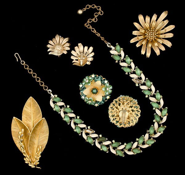 B.S.K., Trifari & Beau Jewels Costume Jewelry Coll: A B.S.K leaf brooch, a Trifari brooch, a pair of Trifari ear clips, a pair of Beau Jewels and a B.S.K necklace; all signed pieces are stamped.
