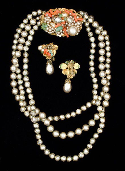 Miriam Haskell Faux Pearl Collection : A Miriam Haskell faux pearl and coral triple strand necklace with matching faux drop baroque pearl ear clips. Note to buyer: This piece is not signed but is considered one of Miriam Haskell's early pi
