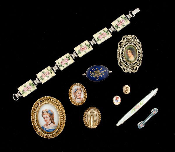 Enamel & Painted Porcelain Costume Jewelry Collect: An enameled bracelet stamped sterling, a pressed flower brooch, a Gerry painted Porcelain brooch, an adult undergarment pin, a child's undergarment pin with enamel, a Warner painted Porcelain brooch a