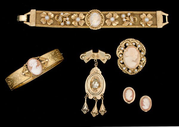 Coro, Florenza & Van Dell Costume Cameo Jewelry Co: A hinged bracelet with a large cameo, a Florenza bracelet with a matching Florenza brooch, a Coro gilded hanging brooch with a faux pearls and a pair of Van Dell cameo ear clips; all signed pieces are