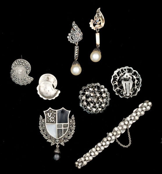 Trifari, Weiss & Sterling Costume Jewelry Collecti: A Trifari bracelet, a pair of Weiss rhinestone ear clips, two pairs of unmarked sterling earrings and an unmarked sterling brooch; all signed pieces are stamped.