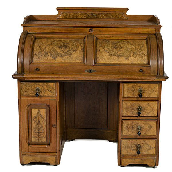 Renaissance Revival Roll Top Desk : Renaissance Revival Roll Top Desk American, probably Grand Rapids, MI, 1870-1880, a roll top desk in walnut and figured walnut veneers, the roll top opening to a fitted interior over two pedestal si