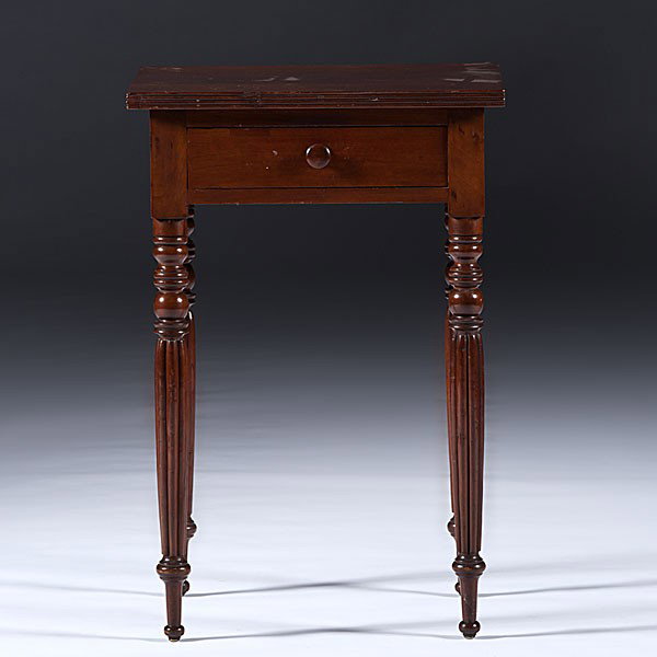 Sheraton One Drawer Cherry Stand : Sheraton One Drawer Cherry Stand Kentucky, 19th century, a Sheraton stand in cherry with poplar secondary having a reeded top, one drawer, and rising on turned and reeded legs; ht. 29, wd. 19.5, dp.