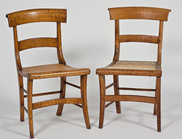 Curly Maple Classical Side Chairs : Curly Maple Classical Side Chairs American, 19th century. Two side chairs in curly maple with bowed and scrolled crest and single slats and (later) caned seats; ht. 32 in, seat ht. 17 in.