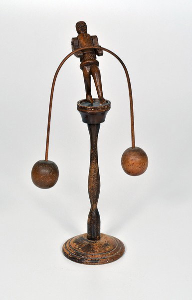 Folk Art Carved Wood Whirly-Gig : Folk Art Carved Wood Whirly-Gig American, a folk art carved wood whirly-gig of figure balanced on pedestal; ht. 13 in.