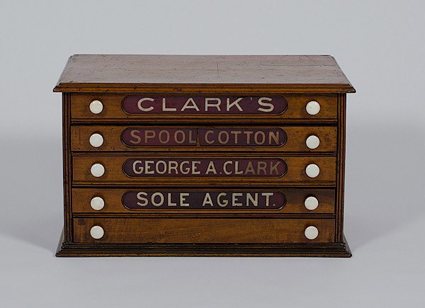 Clark's Spool Cabinet : Clark's Spool Cabinet American. A spool cabinet in walnut with poplar secondary, having five drawers with porcelain knobs and early glass, one marked Clark's; ht. 16.5, lg 28, dp. 18 in.