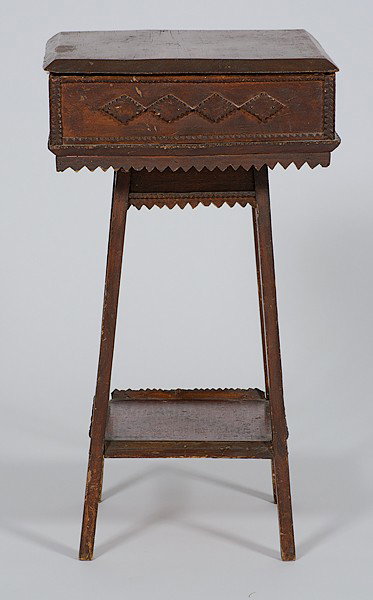 Tramp Art Side Table : Tramp Art Side Table American, early 20th century. A tramp art grained smoking stand with applied decoration and edges, a silk-lined fitted interior, over splayed legs with lower shelf; ht. 27, wd. 
