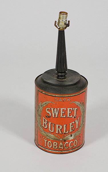 Burley Tobacco Canister Lamp : Burley Tobacco Canister Lamp American, late 19th/early 20th century. A tea canister tin converted to a lamp marked Dark Sweet Burley Tobacco; ht. 22 in.