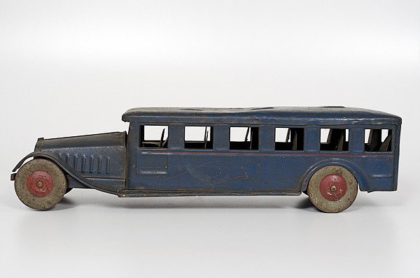 "Cor Cor" Crest Steel Bus : "Cor Cor" Crest Steel Bus American, ca 1930s. A painted metal bus by Coram Manufacturing Company, Washington Indiana; lg. 23.5 in.