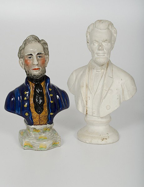 Abraham Lincoln Staffordshire and Plaster Busts : Abraham Lincoln Staffordshire and Plaster Busts A Staffordshire polychrome porcelain bust of Abraham Lincoln; ht. 9.5 in. Plus a plaster form bust of Abraham Lincoln, with illegible signature and da