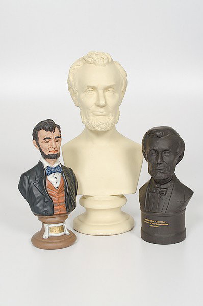 Abraham Lincoln Group of Busts, Including Wedgwood: Abraham Lincoln Group of Busts, Including Wedgwood Bust An assembled lot of three Lincoln busts including a Wedgwood black basalt bust of Lincoln, a white plaster bust; and a painted plaster bust; t