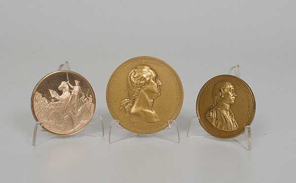 Commemorative Bronze Medallions : Commemorative Bronze Medallions American. Three 20th century commemorative bronze medallions including one of George Washington, dated 1776, one of John Paul Jones, dated 1779, and one titled Victor