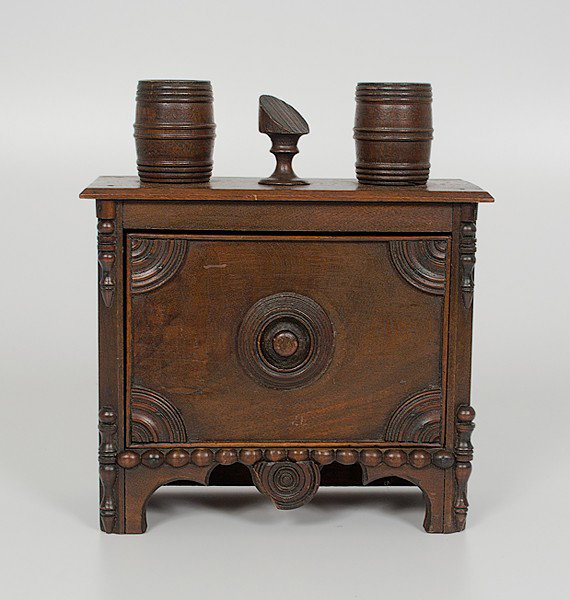 'Make-Do' Smoking Stand : Make-Do' Smoking Stand Kentucky, mid-19th century. A walnut "make-do" smoking stand with butt-jointed front drawer for tobacco, strike pad and two match holders on the top, and applied decoration; h