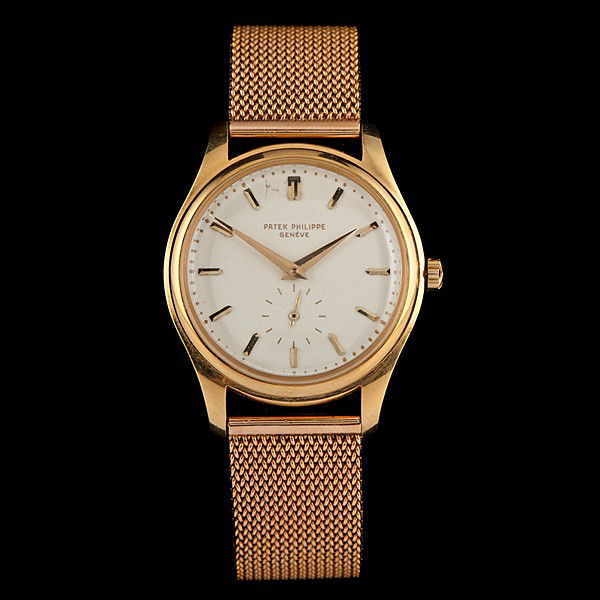 Patek Philippe Calatrava with 18K Gold Mesh Band: Patek Philippe Calatrava with 18K Gold Mesh Band A Patek Philippe gentleman’s dress 18k gold "Calatrava" watch with a separate seconds hand above the 6 hour and a band of 18K gold mesh. A total we