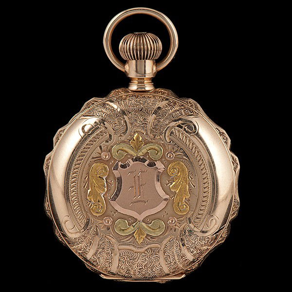 Green & Yellow Gold Illinois Hunter Case Timepiece: Green and Yellow Gold Illinois Hunter Case Timepiece A vintage 14k Elgin hunter case pocket watch, case serial number 182826, engraved with a deer motif of green and yellow gold; a movement serial n