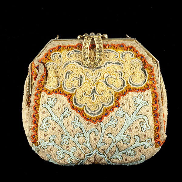 Vintage Longchamps Beaded Handbag. : Vintage Longchamps Beaded Handbag. A fantastic vintage beaded Longchamp handbag, includes the original label, wrist chain and is in fair condition. Measures 5 inches in height, 1 inch in width and 5