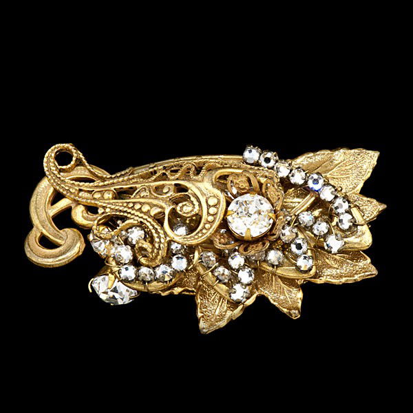 Miriam Haskell Rhinestone Brooch : Miriam Haskell Rhinestone Brooch A Miriam Haskell leaf motif brooch; rhinestones arraigned in a leaf and floral design. Stamped: Miriam Haskell.