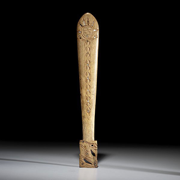 Nuu-chah-nulth Carved Whale Bone Club : Nuu-chah-nulth Carved Whale Bone Club Carved on both sides with avian motif on handle and humanoid figure on blade; red pigment decorates incised lines and small pieces of abalone and glass augment