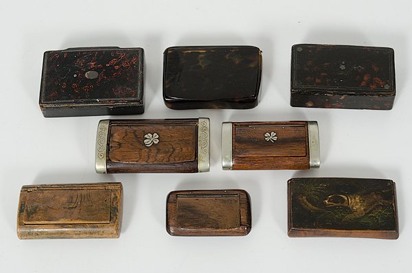 19th Century Continental Snuff Boxes: Europe, 19th century. A group of eight Continental snuff boxes, five wooden, one with painting of a hunting dog, two lacquer ware boxes and one tortoise shell box; largest, lg. 3.25 in., smallest, 2.2