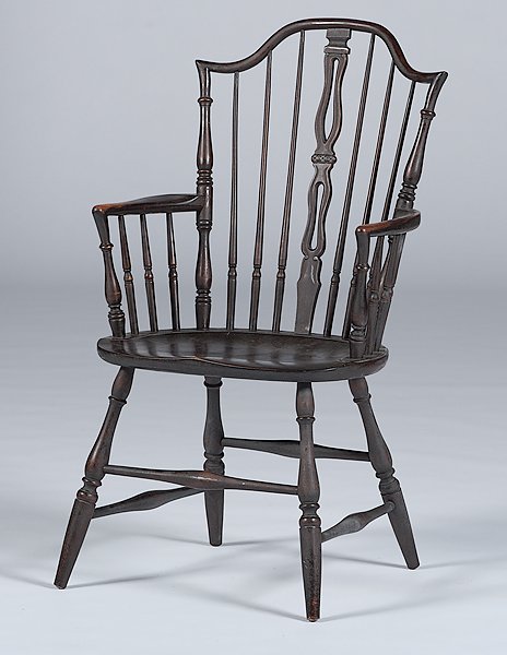 English Windsor Chair : England, 20th century. A Windsor armchair in oak; ht. 40, wd. 22, seat ht. 18 in.