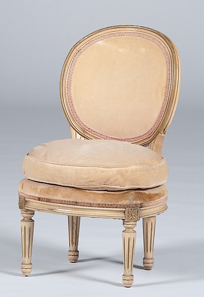 Slipper Chair : Europe, 20th century. A Louis XVI-style slipper chair with an oval backrest above a round upholstered seat, raised on short fluted legs headed by patera; ht. 30.5, seat ht. 11.5 in.