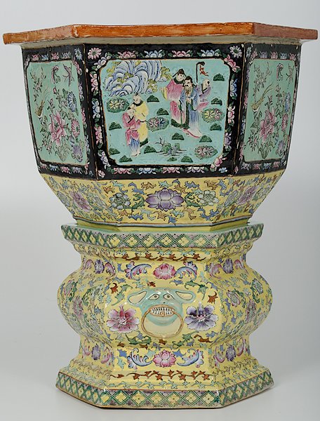 Chinese Yellow Ground Jardiniere and Pedestal: China, Republic period. A yellow ground jardiniere with bats and floral motifs on a hexagonal famille rose base with interior and floral scenes in reserves; ht. 23 in.