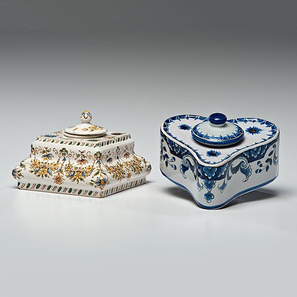 French Faience Inkwells: French Faience Inkwells French. Two hand-painted faience porcelain inkwells, including a heart-shaped Quimper inkwell with painted blue stylized floral decorations on a white ground, marked Quimper /