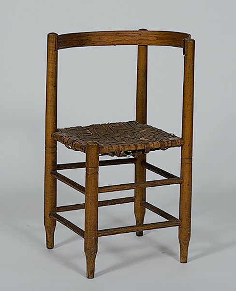 Vernacular Corner Chair : Vernacular Corner Chair American, 19th century, a vernacular corner chair in mixed hardwoods with a split hickory seat and back, and rising on turned legs connected by stretchers; ht. 28.75 in.