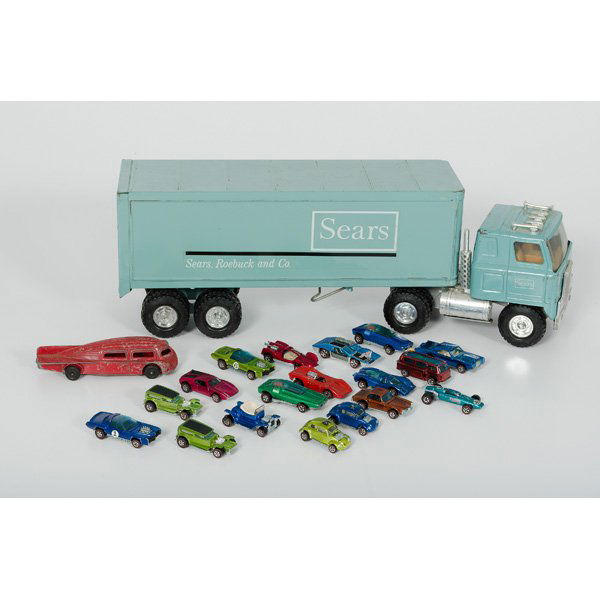 Large Lot of Automobile Toys : Large Lot of Automobile Toys Lot of 20 includes 18 Mattel Hot Wheels from 1968-1970, a tin Sears, Roebuck and Co. semi truck, and a #706 Manoil diecast rocket car.