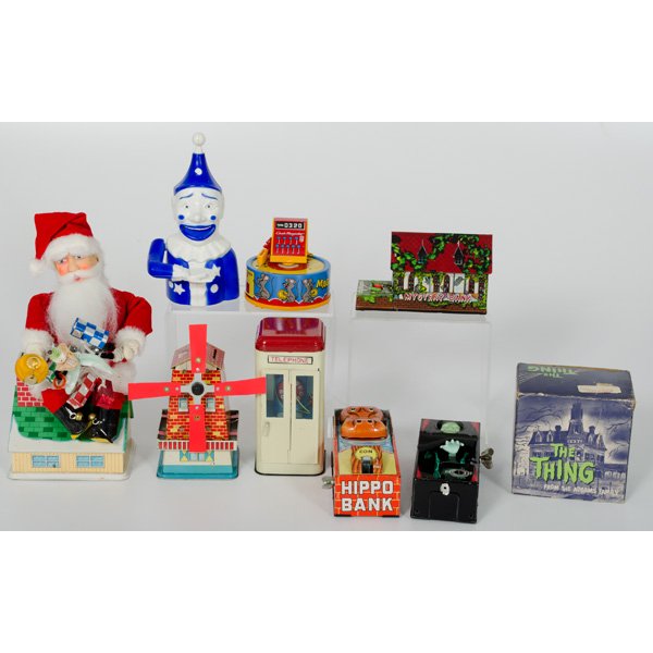 Lot of Boxed Mechanical Toy Banks : Lot of Boxed Mechanical Toy Banks Lot of 9 includes mechanical The Thing from the Addams Family, a Yone automatic action coffin bank, a Banthrico International Inc. Sav-O the clown bank, a Yone "Mag