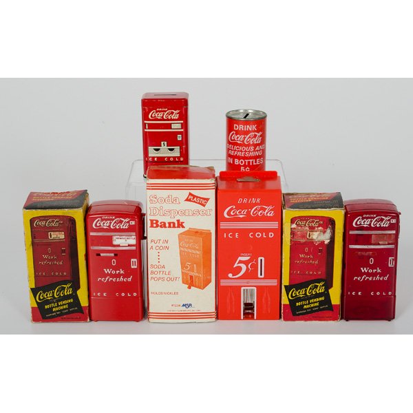 Lot of Coca-Cola Banks : Lot of Coca-Cola Banks Lot of 5 includes a cylindrical tinDrink Coca-Cola advertising still bank, a rectangular tin Have a Coke still bank with removable lid, a plastic soda dispenser nickel bank fr