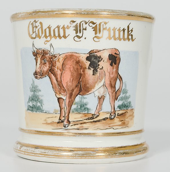 Dairy Farmer's Occupational Shaving Mug : Dairy Farmer's Occupational Shaving Mug Porcelain with polychrome painted scene of a dairy cow. Gilt name Edgar F. Funk. Bottom marked in gilt Eisemann. Ht. 3.5".