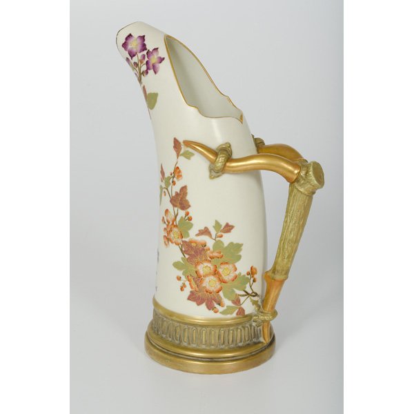 Royal Worcester Pitcher : Royal Worcester Pitcher England. A floral enameled and gold gilded pitcher with gold gilded horn handles, marked with the purple Royal Worcester mark; ht. 11.5 in.