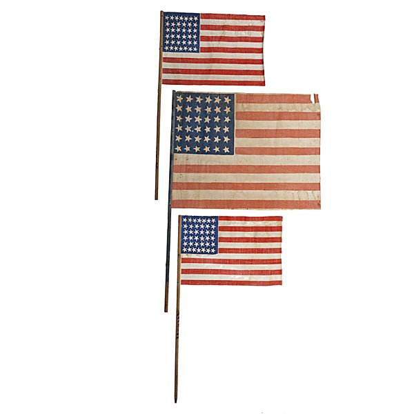 Group of 36 and 38-Star American Parade Flags : Group of 36 and 38-Star American Parade Flags Lot of 3 glazed cotton, printed parade flags mounted on wooden dowels, including: one 36-star flag, with stars configured in 6/6/6/6/6/6 horizontal rows