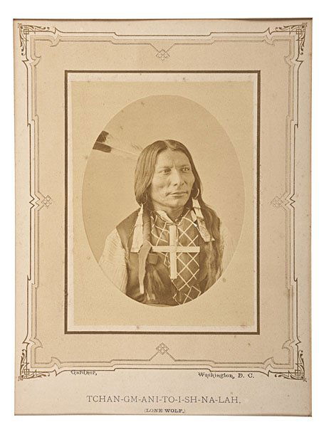 Gardner Photo - Lone Wolf, Tchan-Gm-Ani-To-I-Sh-Na: Alexander Gardner Photograph of Lone Wolf, Tchan-Gm-Ani-To-I-Sh-Na-Lah Albumen print, 4 x 5.25 in., tipped on ornately scrolled Blackmore Museum mount, 7.75 x 10.25 in., ca 1870. Handsome portrait o