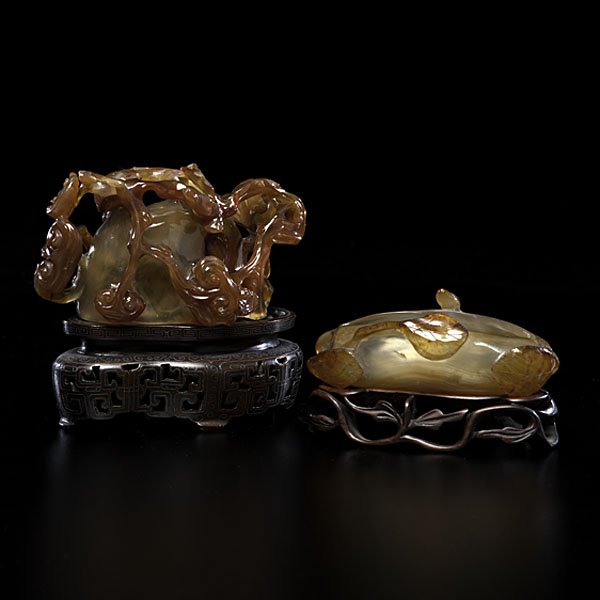 Agate Brush Washers : Agate Brush Washers Chinese, 19th century. Two agate brush washers each with carved lotus flowers and on wooden stands, unmarked; largest lg. 4.75 in. Provenance: Ex Louis Cotlow Collection Ex P