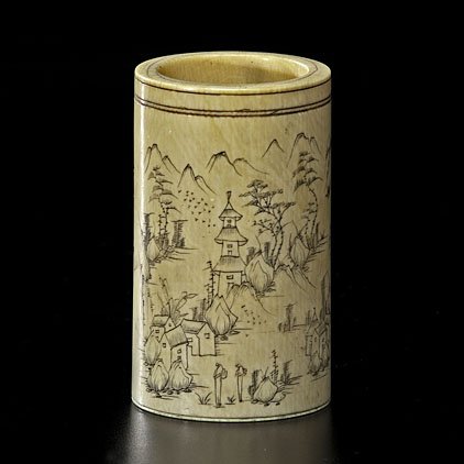 Small Ivory Brush Pot : Small Ivory Brush Pot Chinese, 19th century. A small ivory cylindrical brush pot with inked scene of a village and carved calligraphic script, unmarked; ht. 3.25 in. Special Provenance Note: In