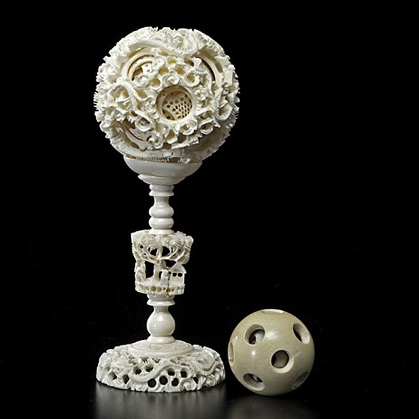 Chinese Ivory Puzzle Ball, Plus : Chinese Ivory Puzzle Ball, Plus Chinese, late 19th century. An ornately carved ivory puzzle ball on stand with dragon motifs. PLUS an ivory puzzle ball; tallest ht. 8 in. International shippi