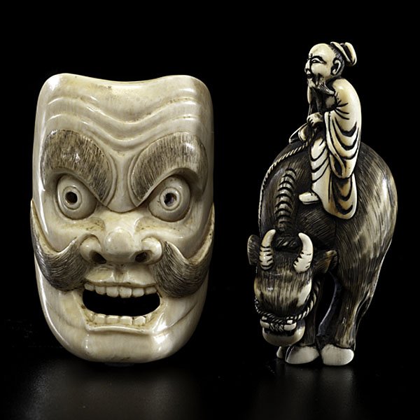 Japanese Meiji Period Ivory Netsukes : Japanese Meiji Period Ivory Netsukes Japanese, Meiji period. A pair of finely carved ivory netsukes, including a mask, signed, and sage on water buffalo; tallest ht. 2.75 in. International sh