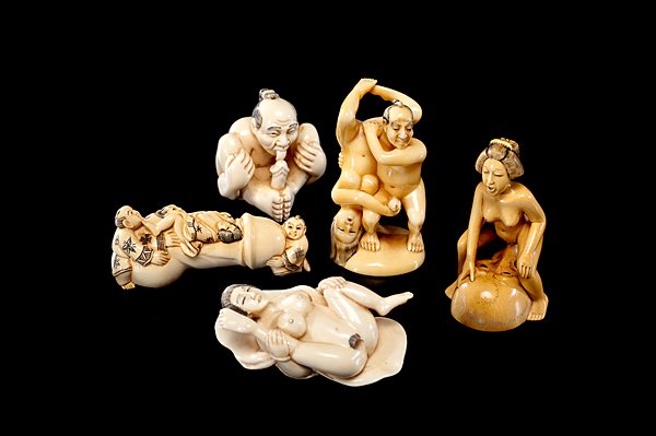 Japanese Carved Ivory Erotic Netsuke : Japanese Carved Ivory Erotic Netsuke Japanese, 20th century. A group of five erotic ivory netsukes, each signed in red, and each inked throughout; tallest 2 in. International shipping is not avai