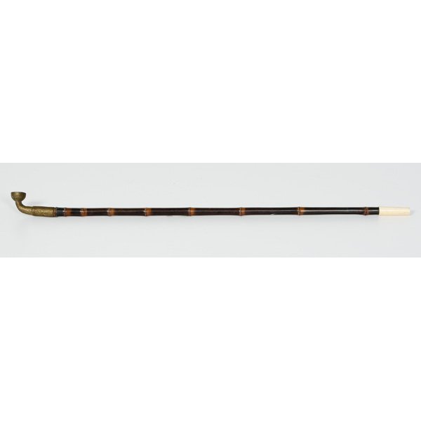 Brass and Ivory Opium Pipe : Brass and Ivory Opium Pipe Chinese. A brass opium pipe with bamboo stem and ivory mouthpiece, unmarked; lg. 26 in. International shipping is not available for this item. This item will only be shipp
