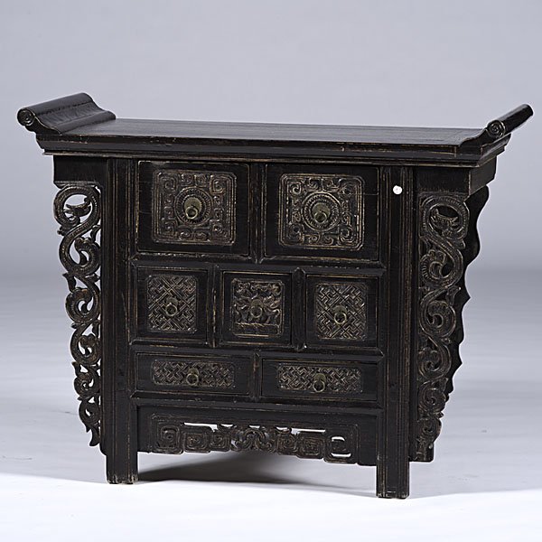 Chinese Carved Altar Table : Chinese Carved Altar Table Chinese. A lacquered elmwood altar table, the rectangular top projecting above the conforming case, fitted with five carved drawers, flanked by carved pilasters continuing